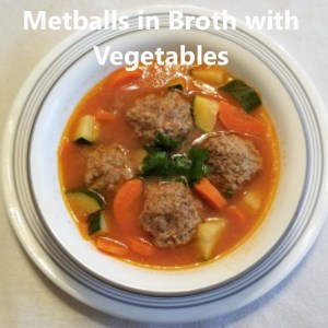 meatballs in broth with vegetables