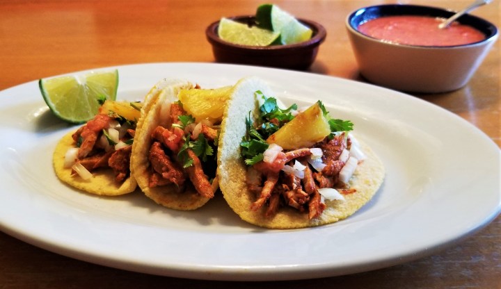 017 serve with limes and spicy salsa, cilantro, onions and pineapple