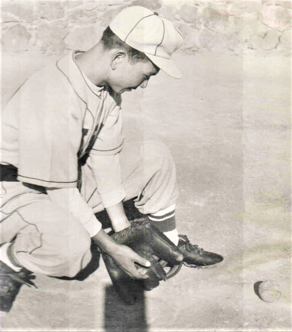 My dad playing baseball