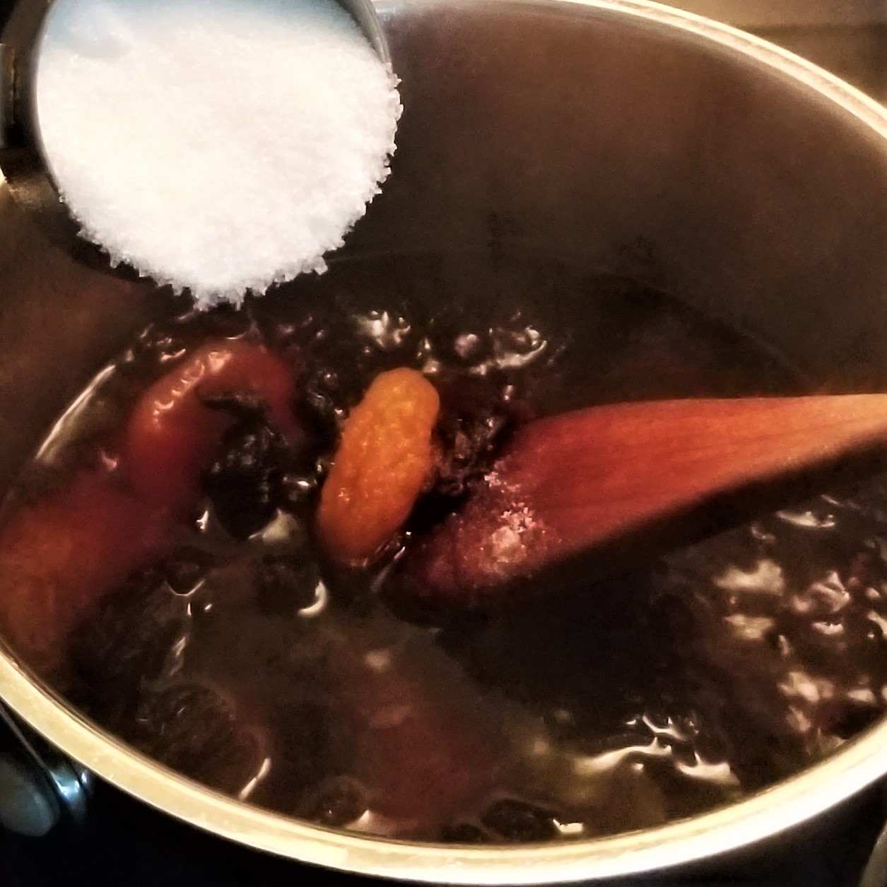 103 cook apricots, hibiscus in water add sugar